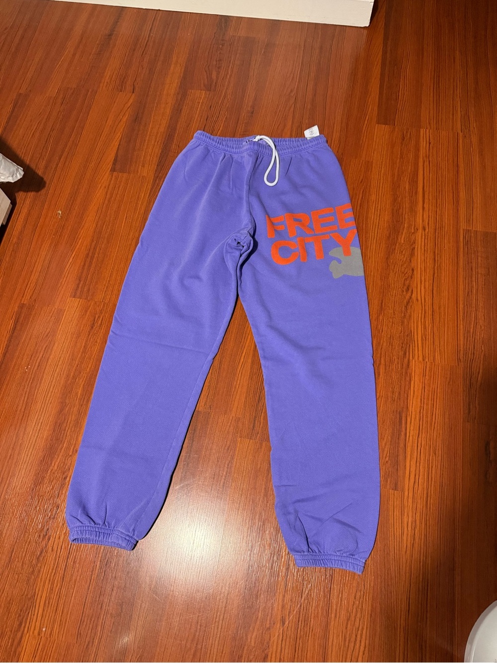 freecity Purple Track Pants with Orange Logo